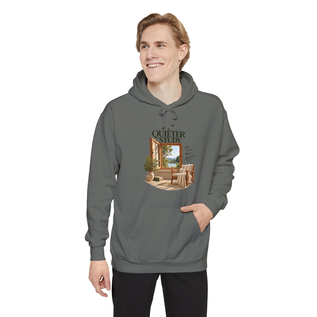 A Quieter Study Grey garment-dyed hoodie, modeled front view, showing the window, chair and plant graphic.