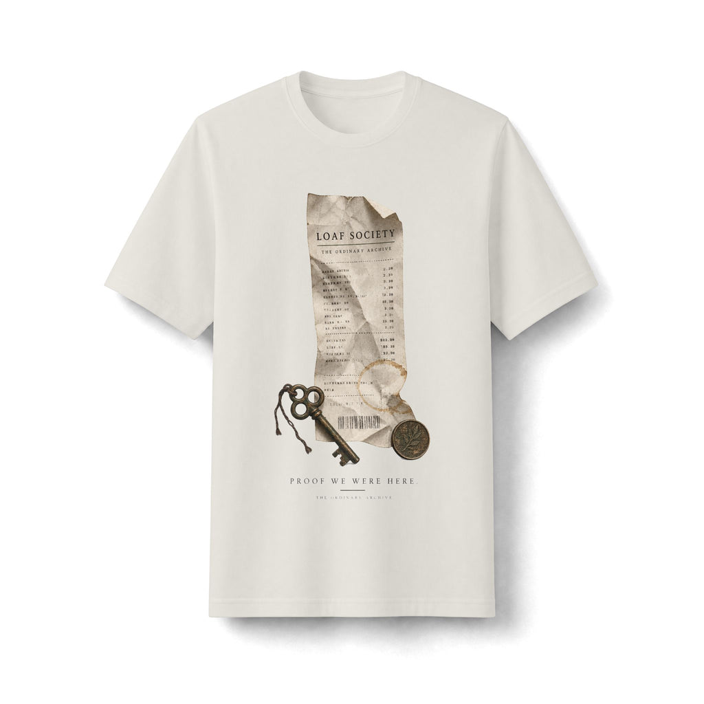 Bone heavyweight T-shirt, front view, with The Last Receipt artwork showing a worn receipt, old key and coin.