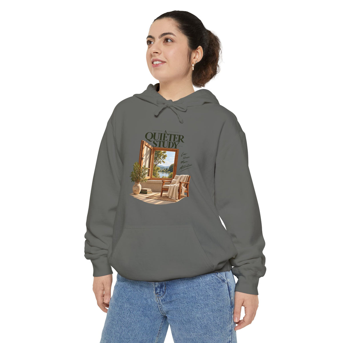 A Quieter Study Grey garment-dyed hoodie, modeled front view, showing the window, chair and plant graphic.